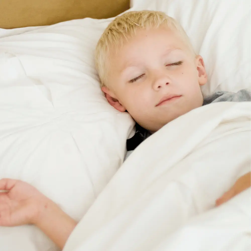 Blonde boy sleeping peacefully