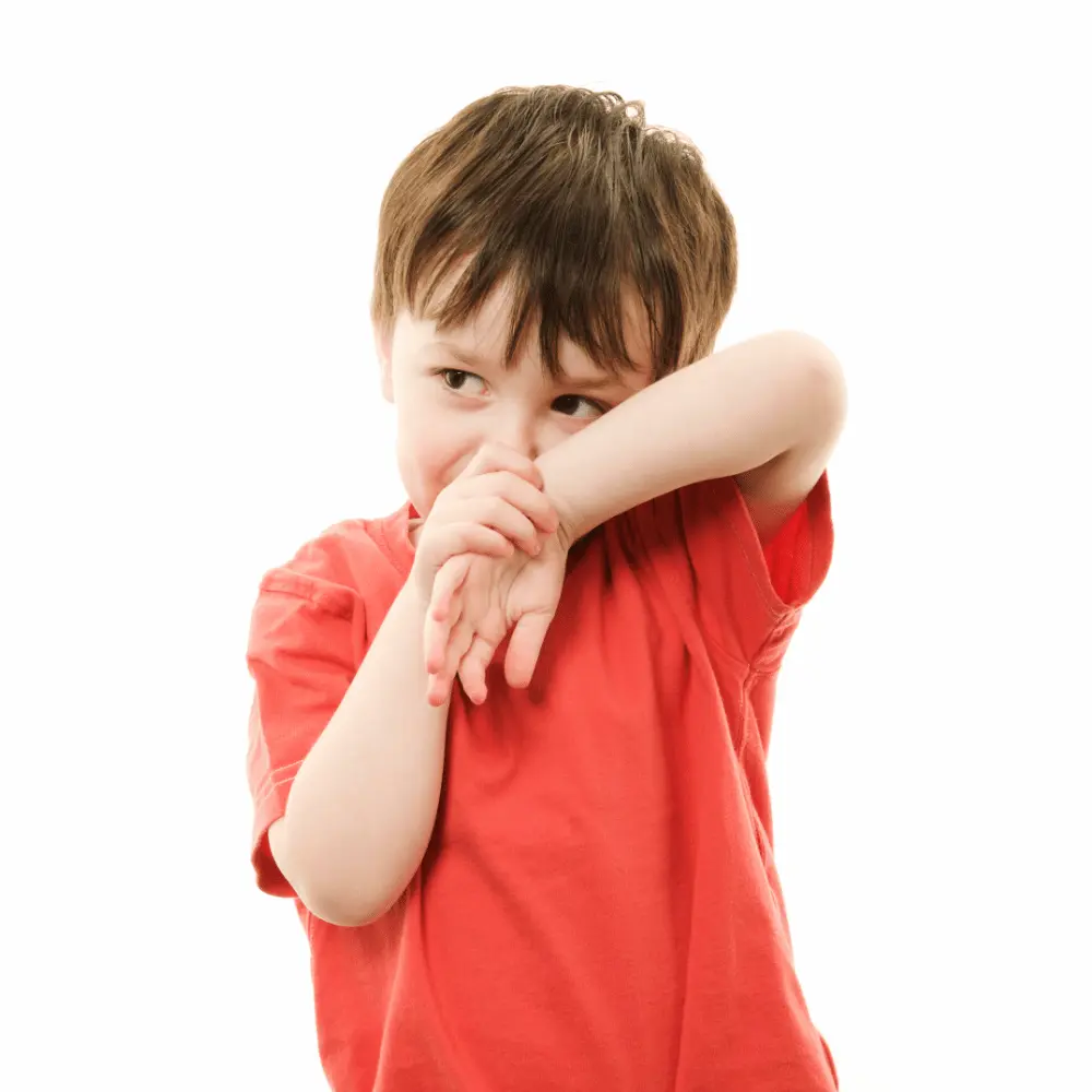 Toddler rubbing tired eyes
