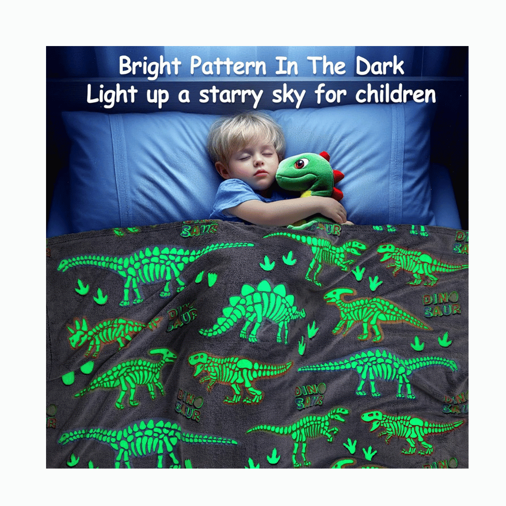 Dinosaur glow blanket green prints.