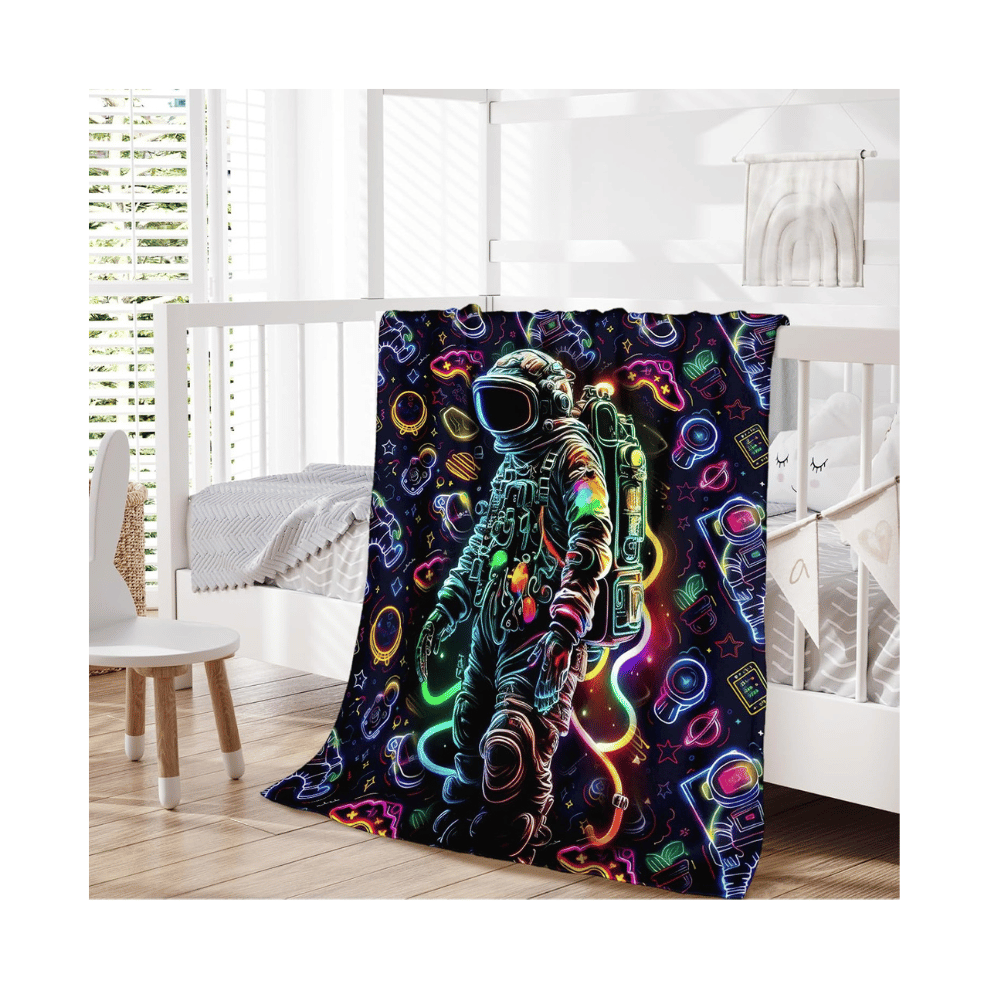 Colorful astronaut space kids blanket design.