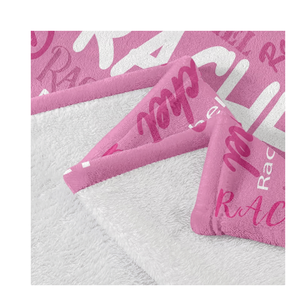 Pink fleece blanket with name prints.