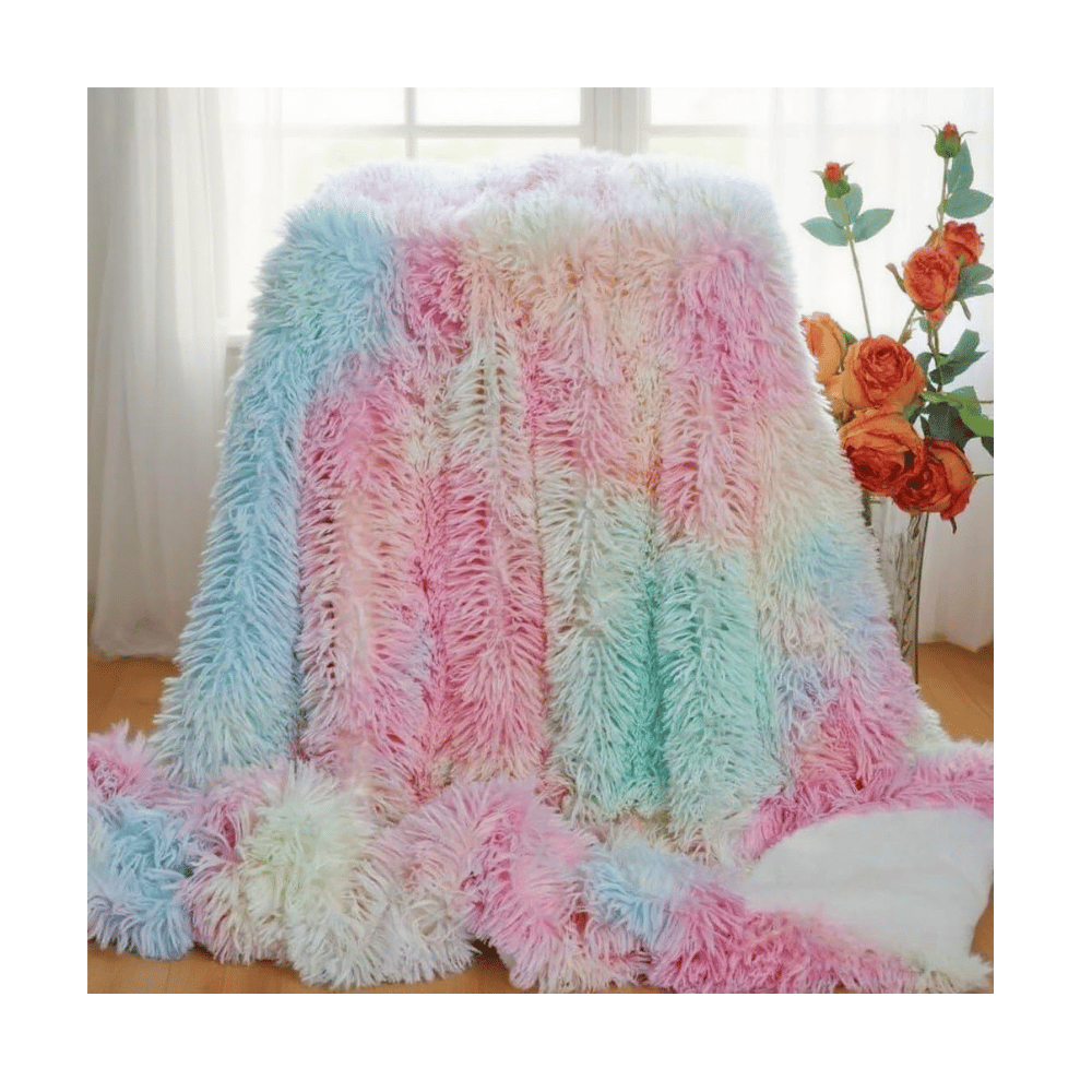 Pastel rainbow fluffy tie-dye blanket.