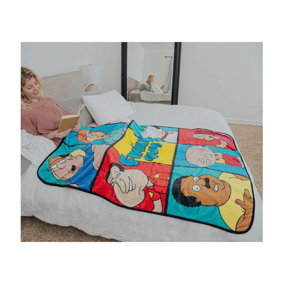 Cozy Family Guy character grid blanket displayed on sofa for adults