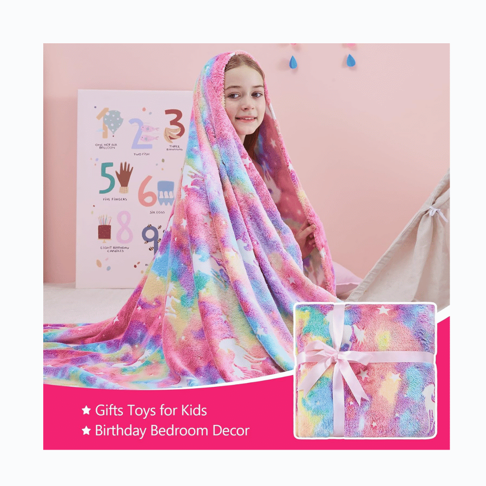 Rainbow unicorn glow throw blanket.