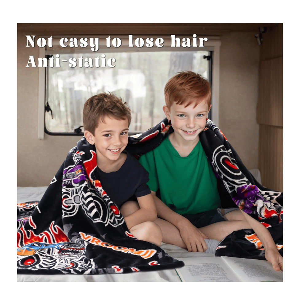 Black glow blanket with trucks.