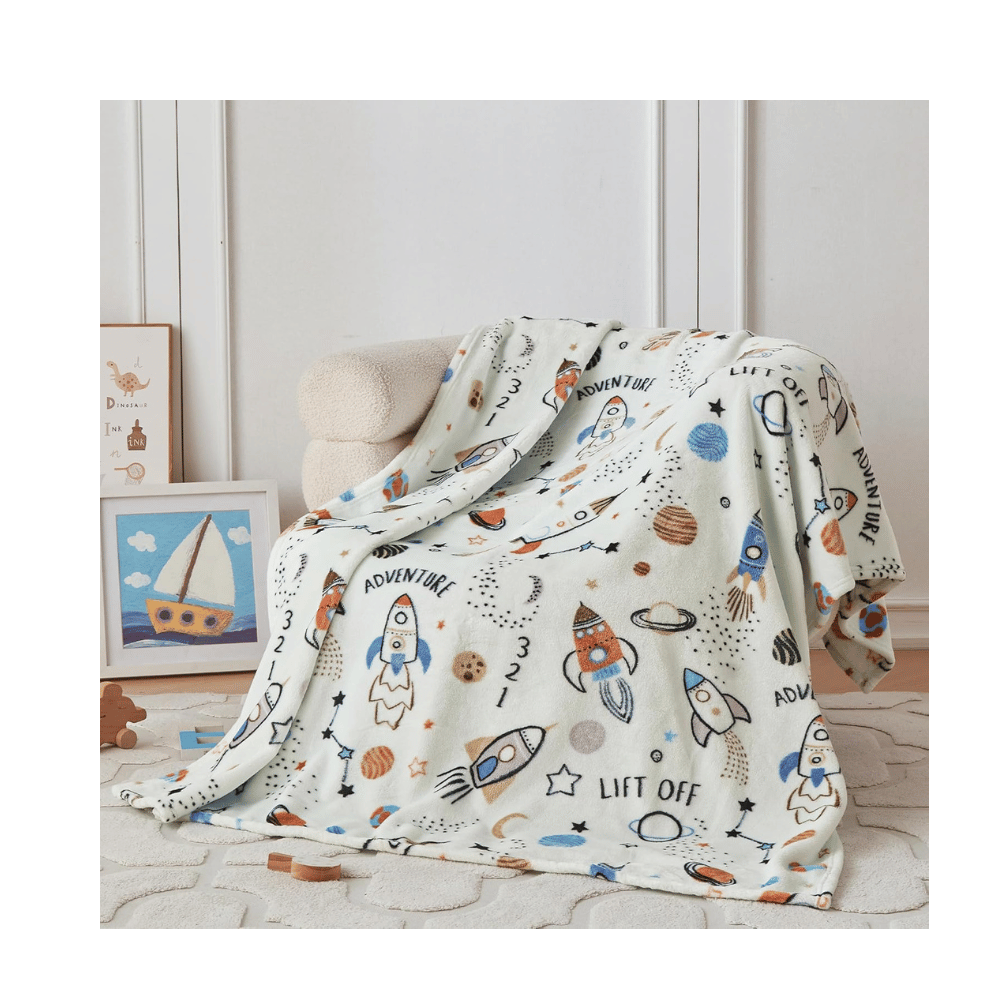Space rocket print kids throw.