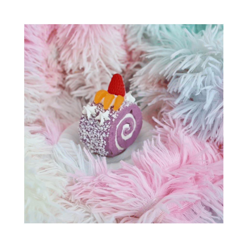 Fluffy rainbow faux fur blanket.
