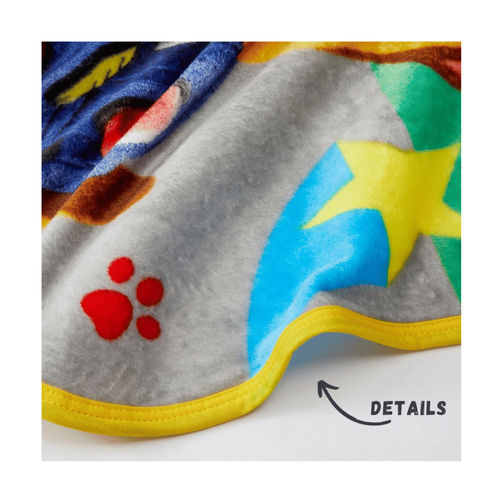 Colorful cartoon Paw Patrol blanket.