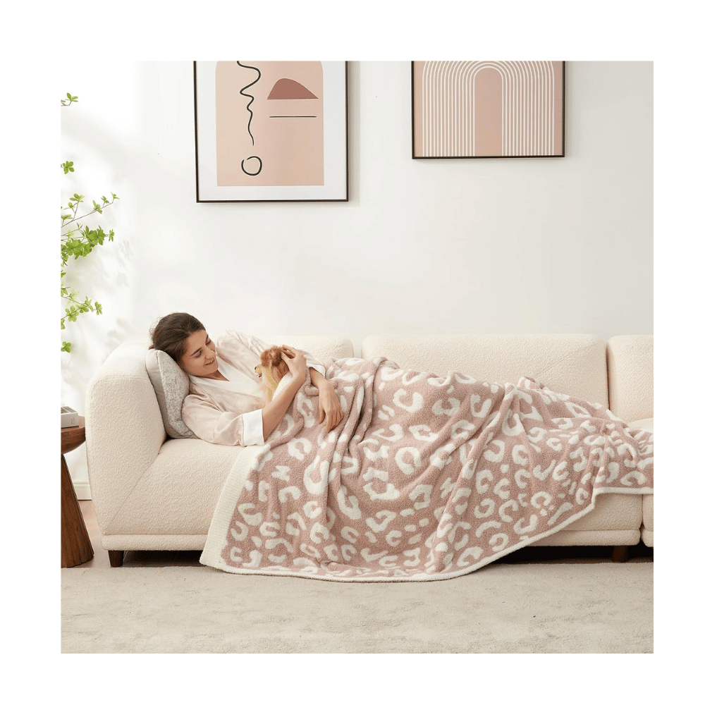 snuggle sac throw blanket beige leopard pattern on sofa